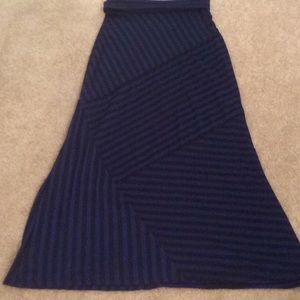 Green envelope Blue and black stripe maxi skirt.